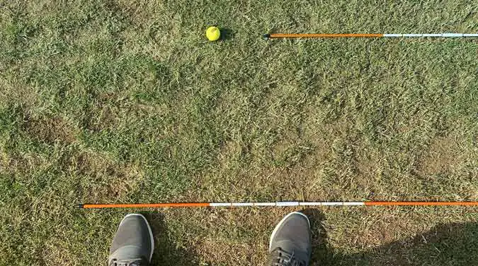 how to use alignment sticks in golf