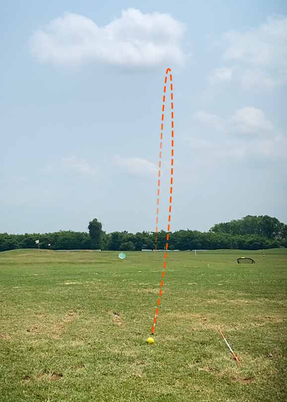 golfer visualizing shot on the driving range