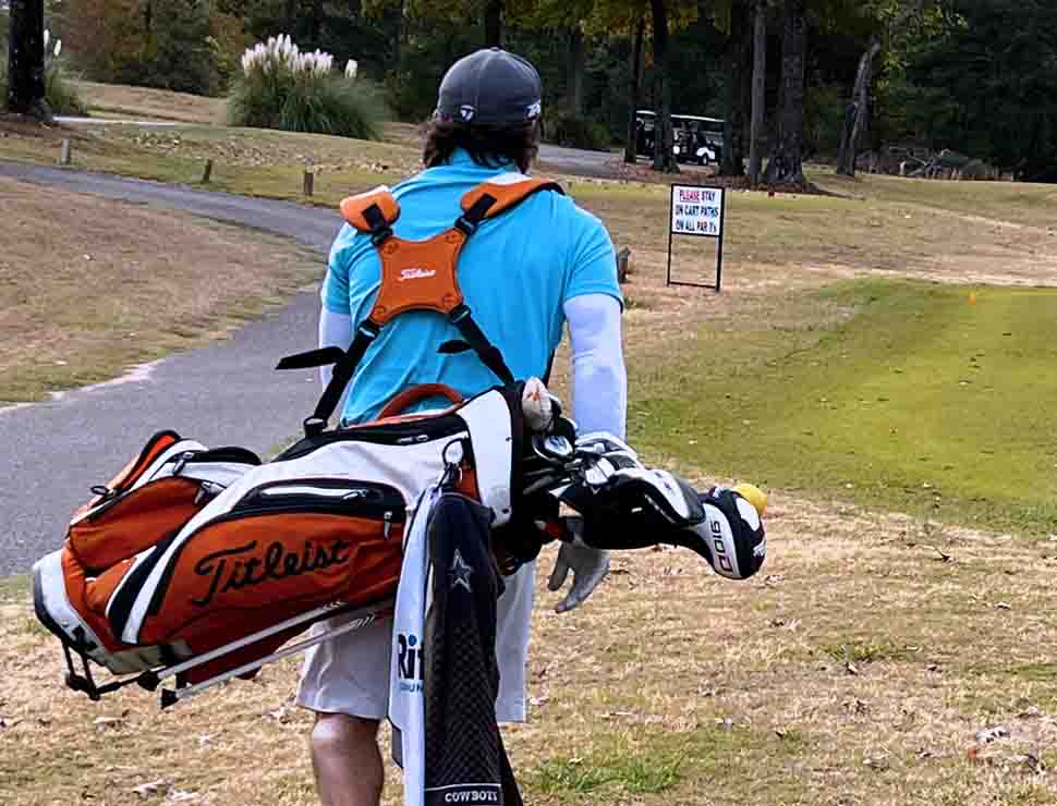beginner golfer walking golf course